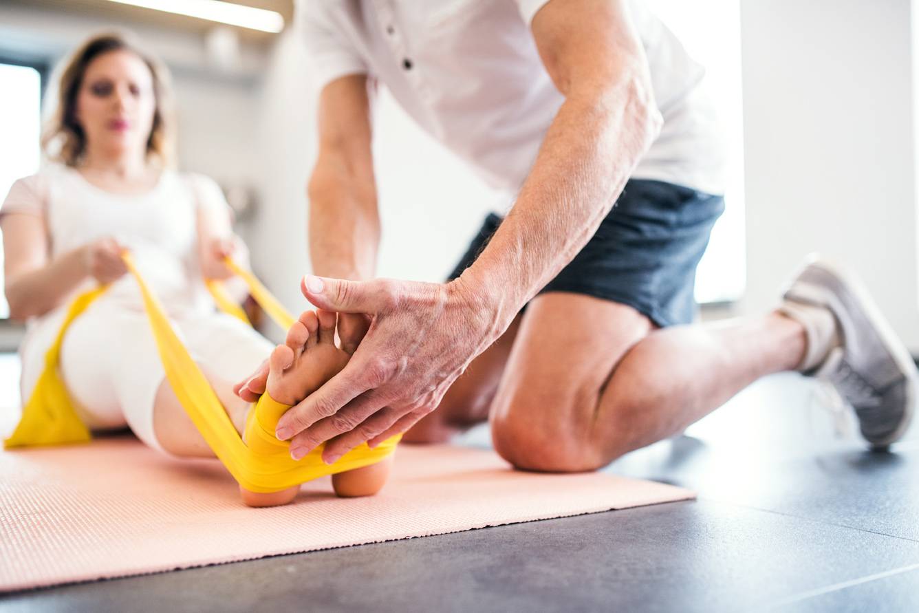 lady doing ankle rehab exercises