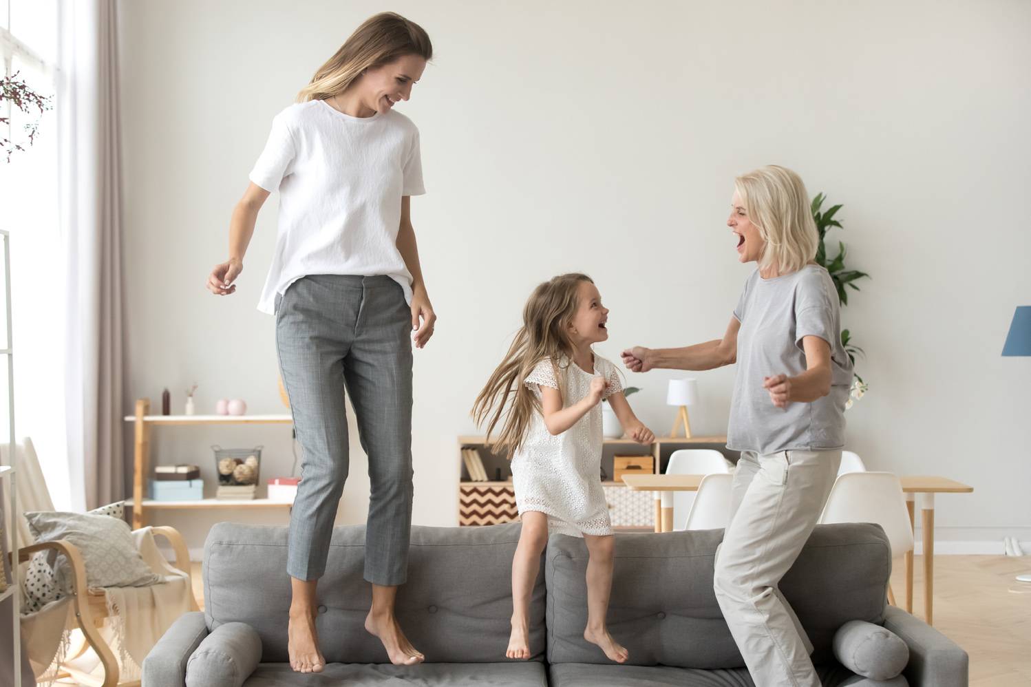 grandmother, mother & daughter having fun