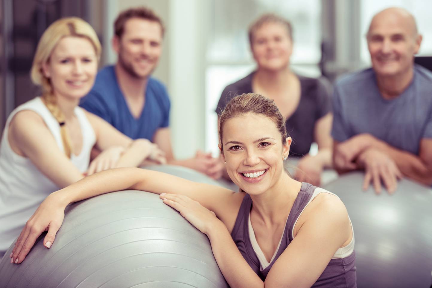 group exercising with exercise physiologist