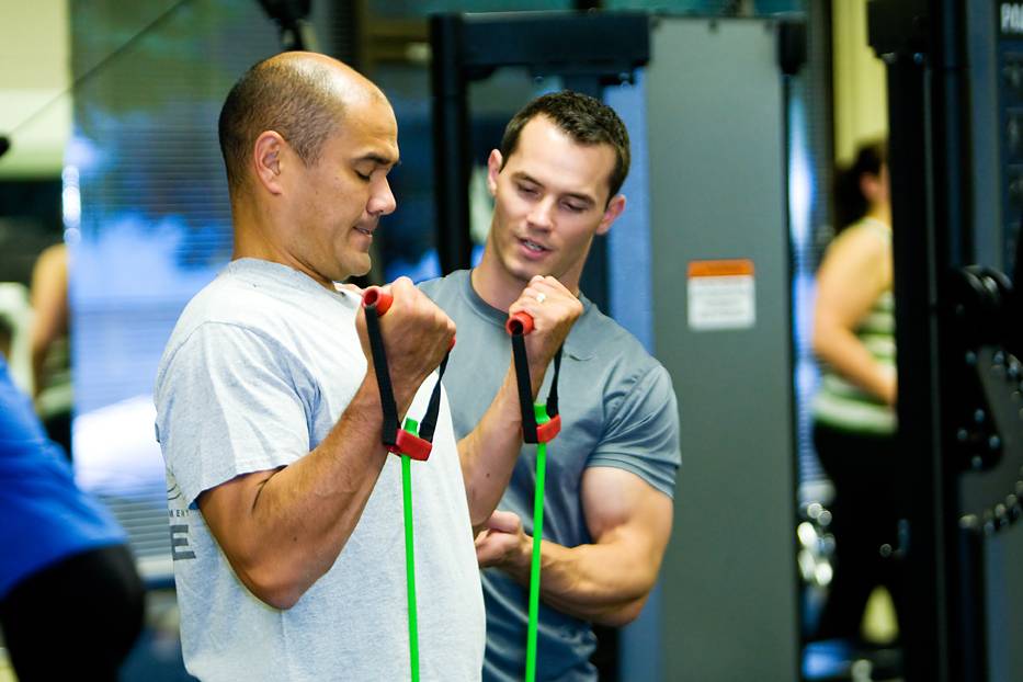 Man Exercising with Exercise Physiologist