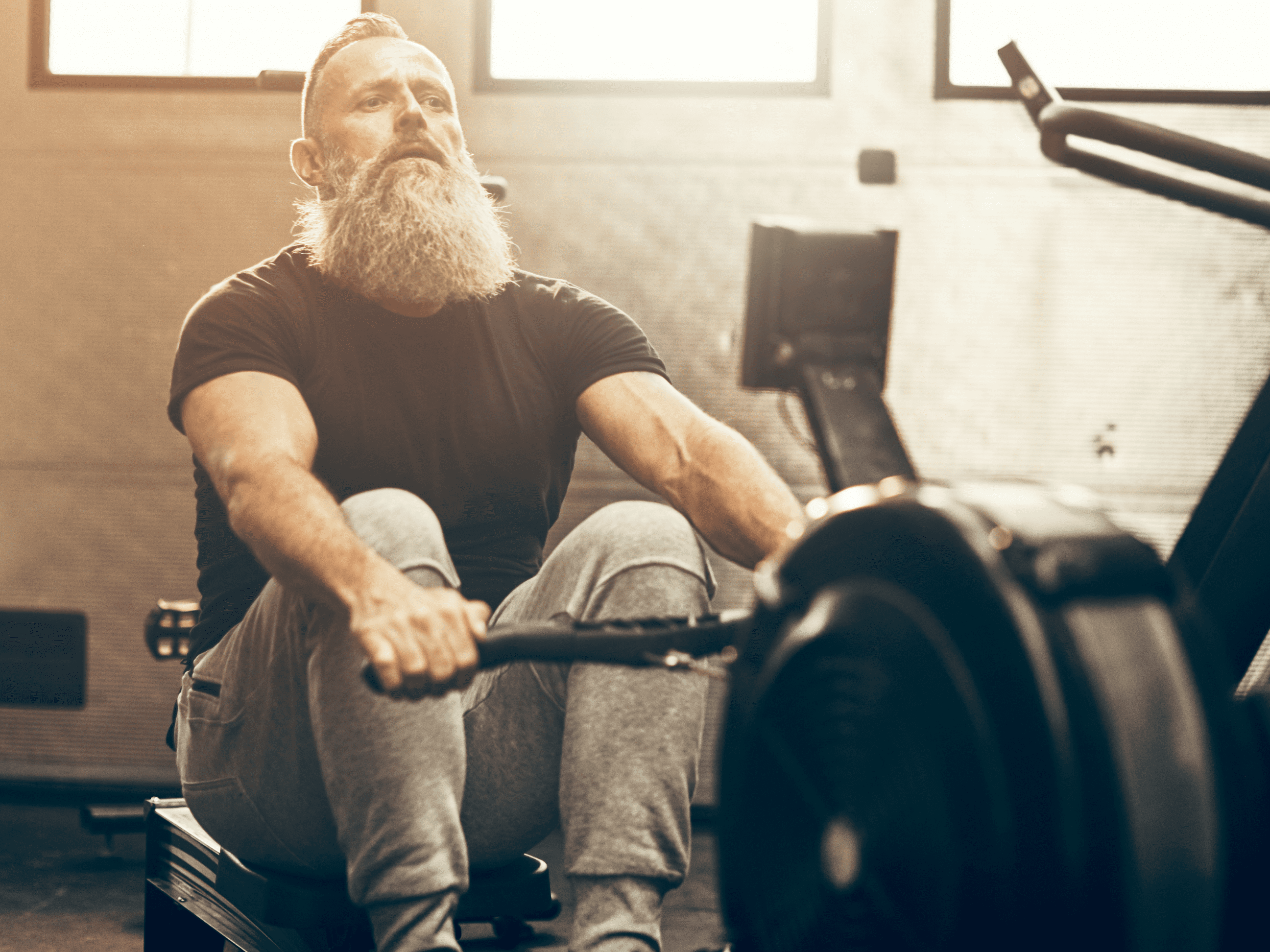 Mature man on ski machine